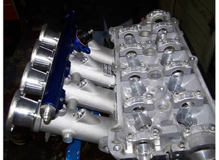 Illustration for article titled ITBs And Engine Porn Mega-Gallery